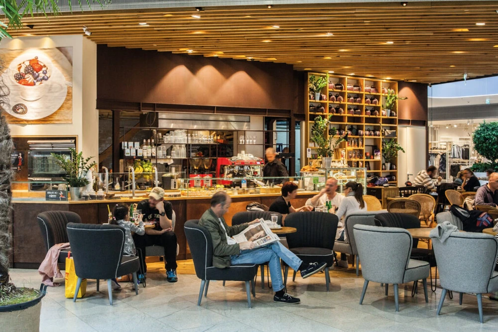 Guests enjoying the spacious Mondieu café at Bory Mall