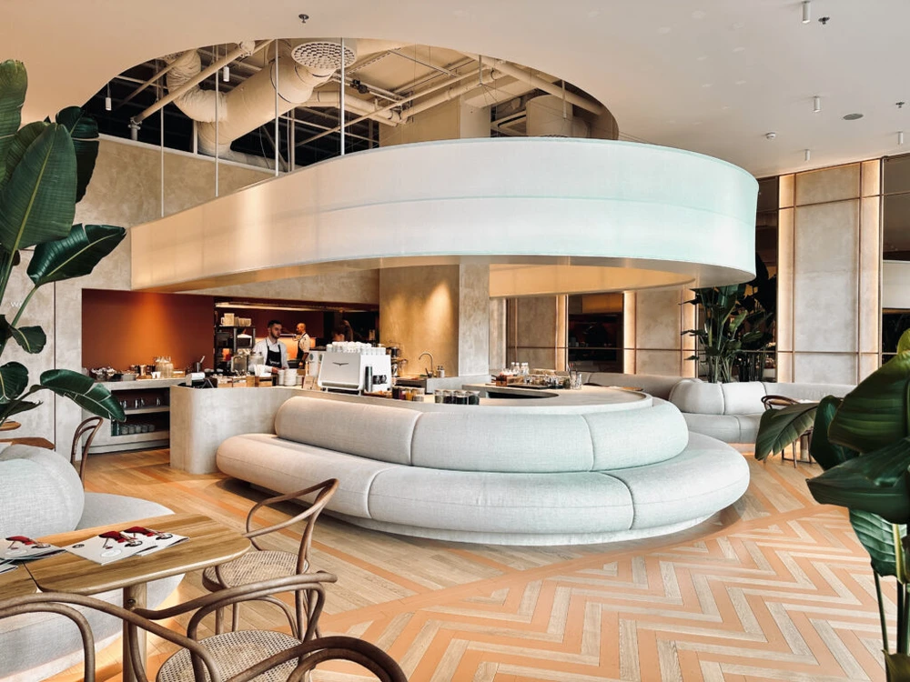 Curved coffee bar and contemporary interior of Mondieu Eurovea 2