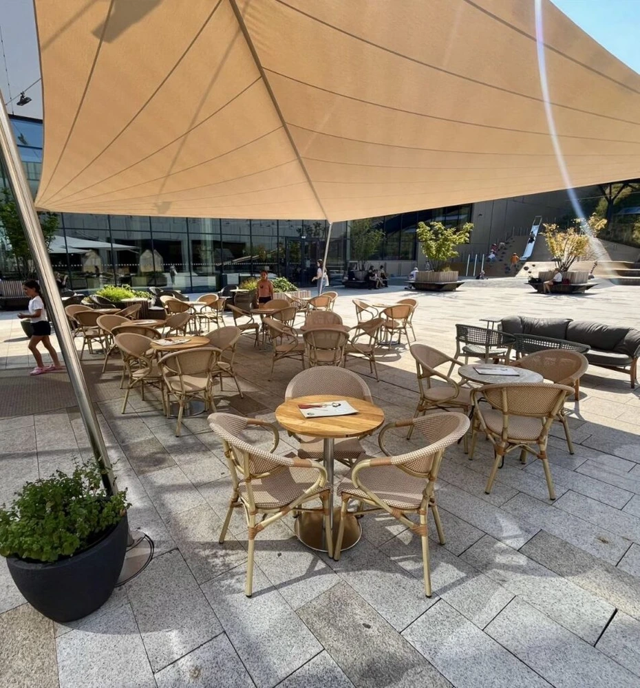 Outdoor terrace tables at Mondieu Nivy Mall in Bratislava