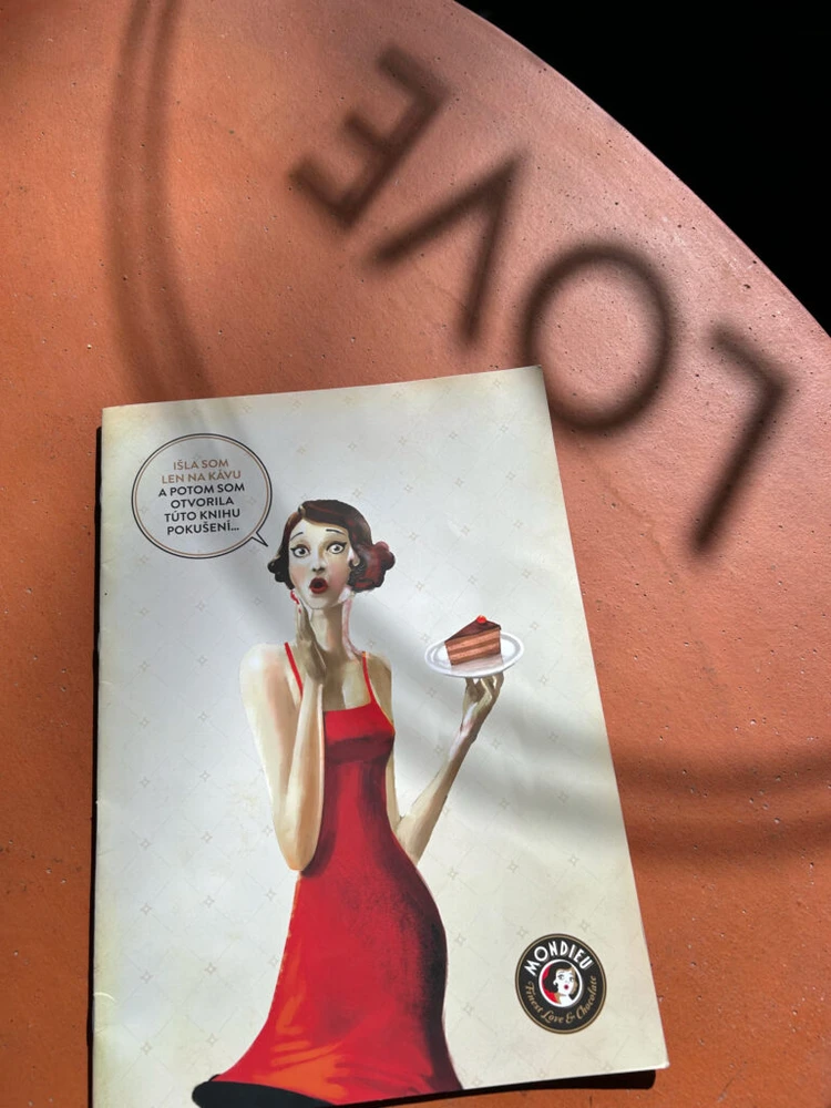 Mondieu gift card presented at the Nivy Mall café